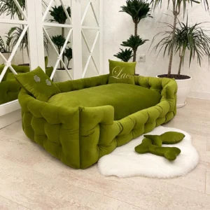 This luxurious velvet dog bed, made for large and extra-large breeds, will provide your pet with the utmost comfort. This unique dog bed blends comfort and sophistication with its soft-touch velvet fabric, supportive cushioning, and sophisticated sofa-like design. It's a great addition to any pet-loving home and is wonderful for relaxing, napping, or sleeping at night. Strong, machine-washable, and exquisitely designed, this is more than just a bed; it's a canine throne.